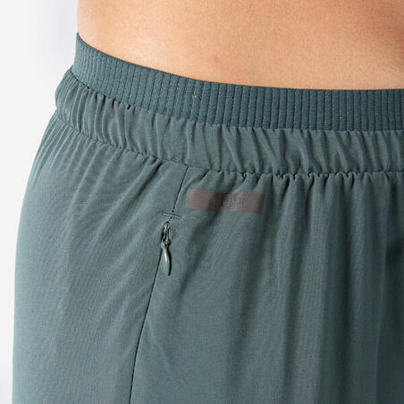 Штани жіночі Run 500 Dry для бігу темно-зелені