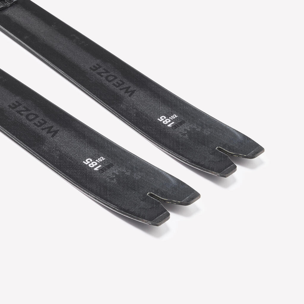 Cross-country skiing with bindings and skins, WILDER 102