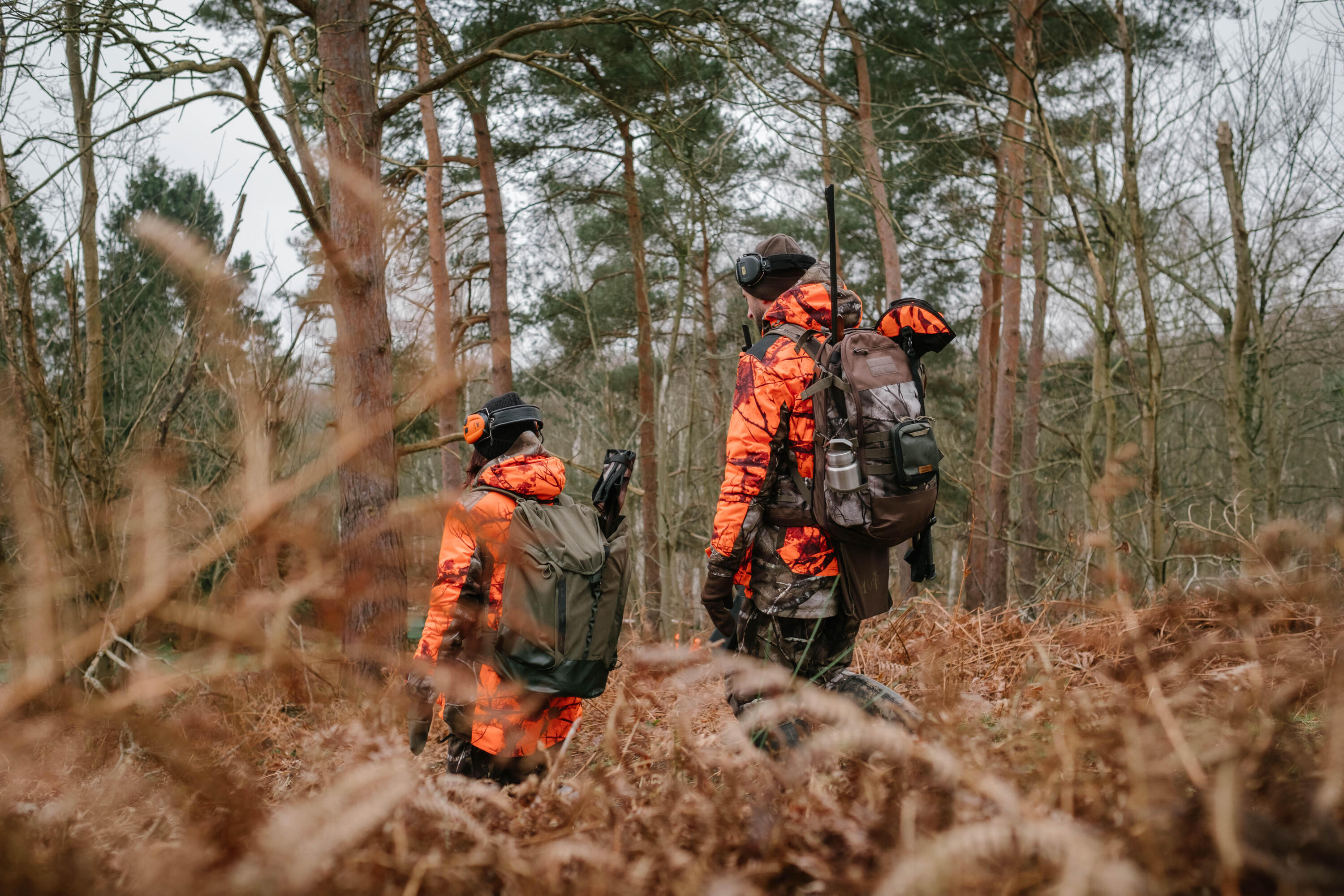 Veste chasse femme 3 en 1 chaude imperméable silencieuse camouflage fluo 500 23/25