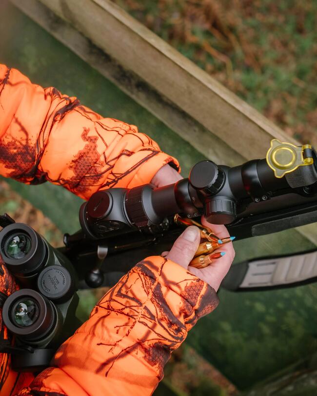 Loading exergy blue Solognac bullets into the chamber of a rifle