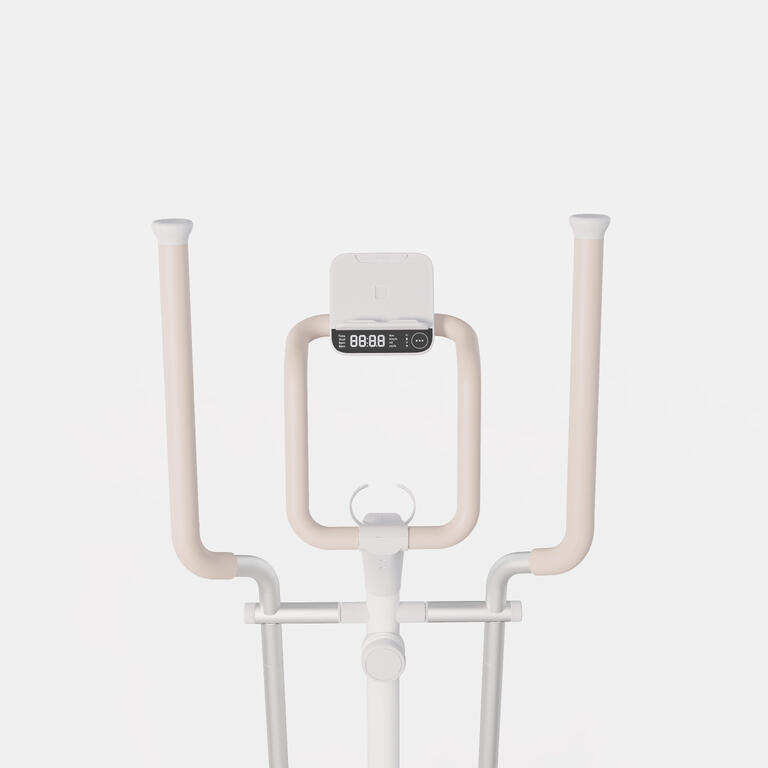 Compact white Domyos elliptical cross trainer