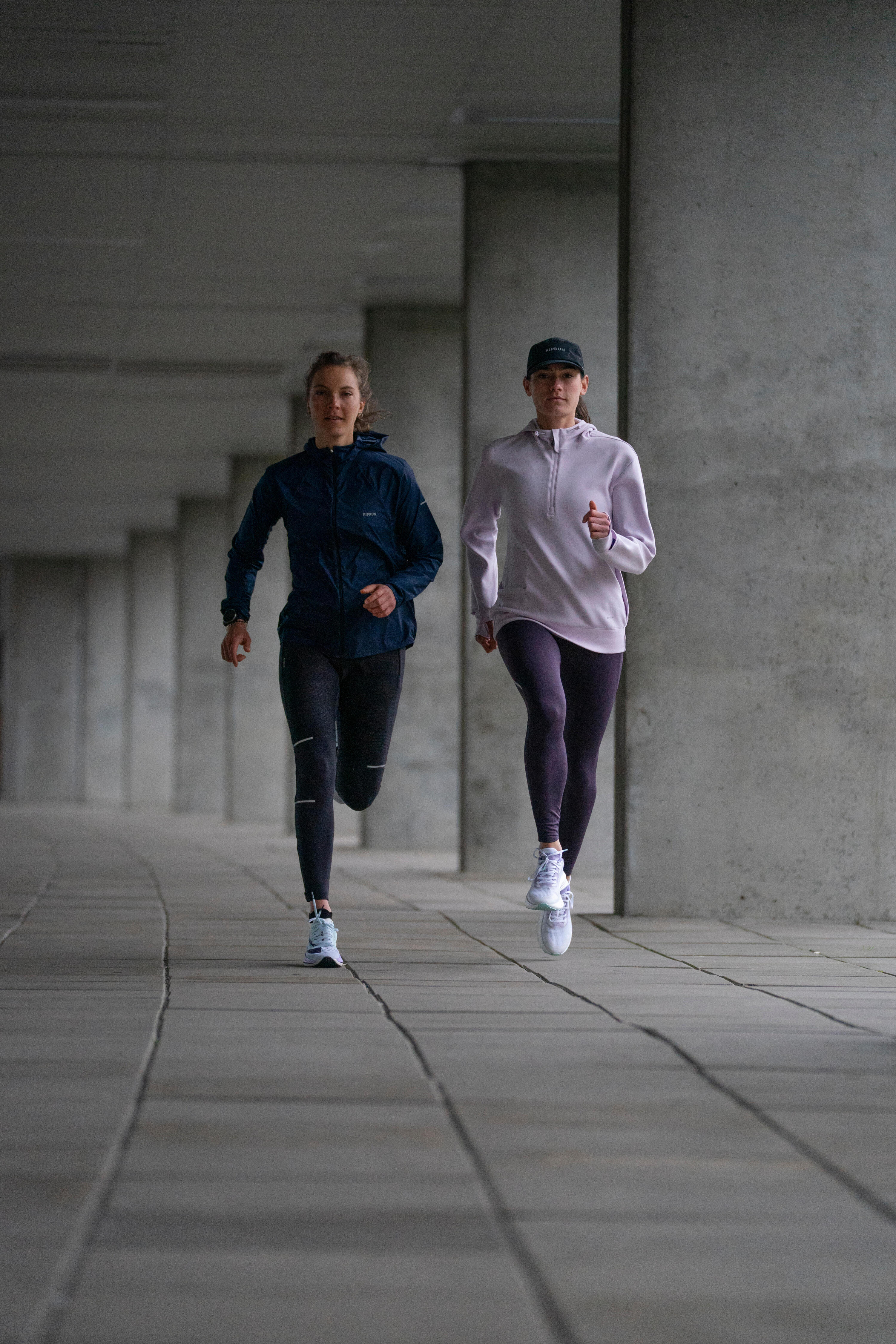 Manteau de course coupe-vent femme Run 900 14/15
