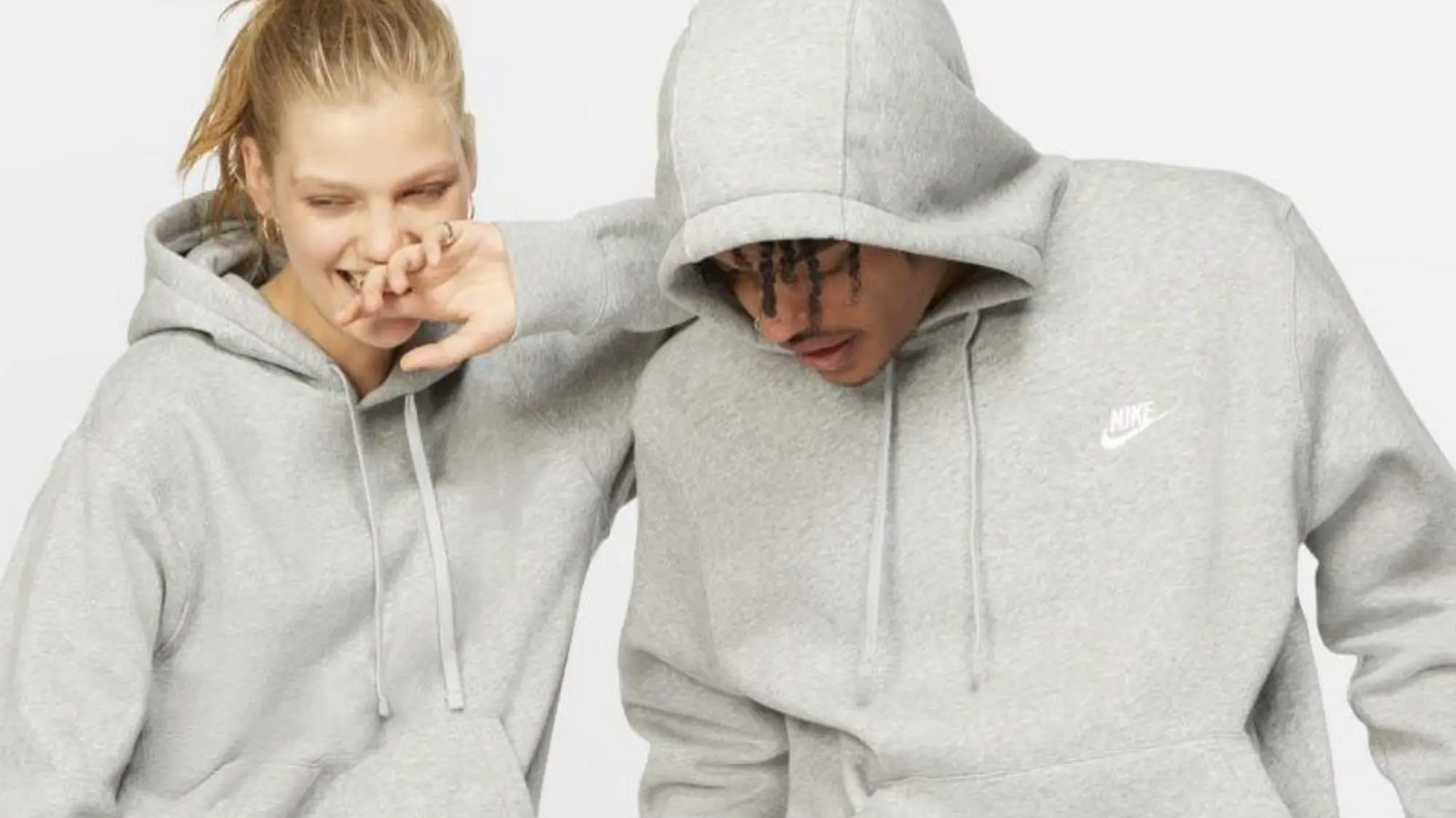 Kobieta i mężczyzna w sportowych bluzach nike