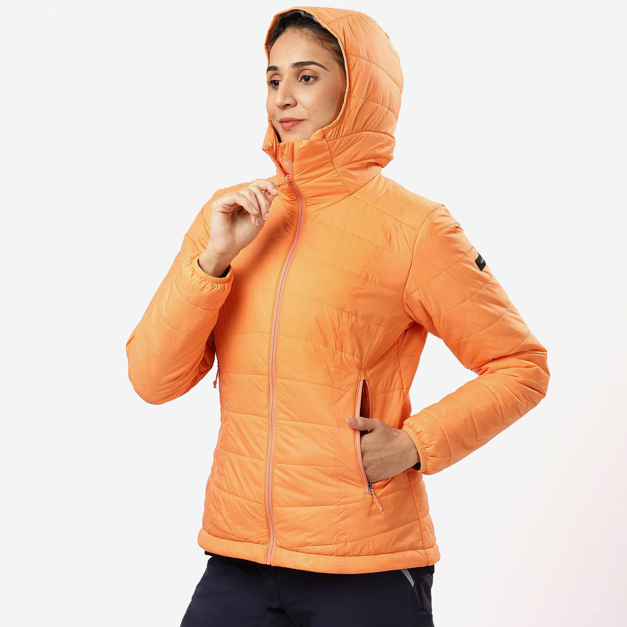 Women Warm Puffer Jacket with hood for mountain trekking- MT100  -5°C - Orange