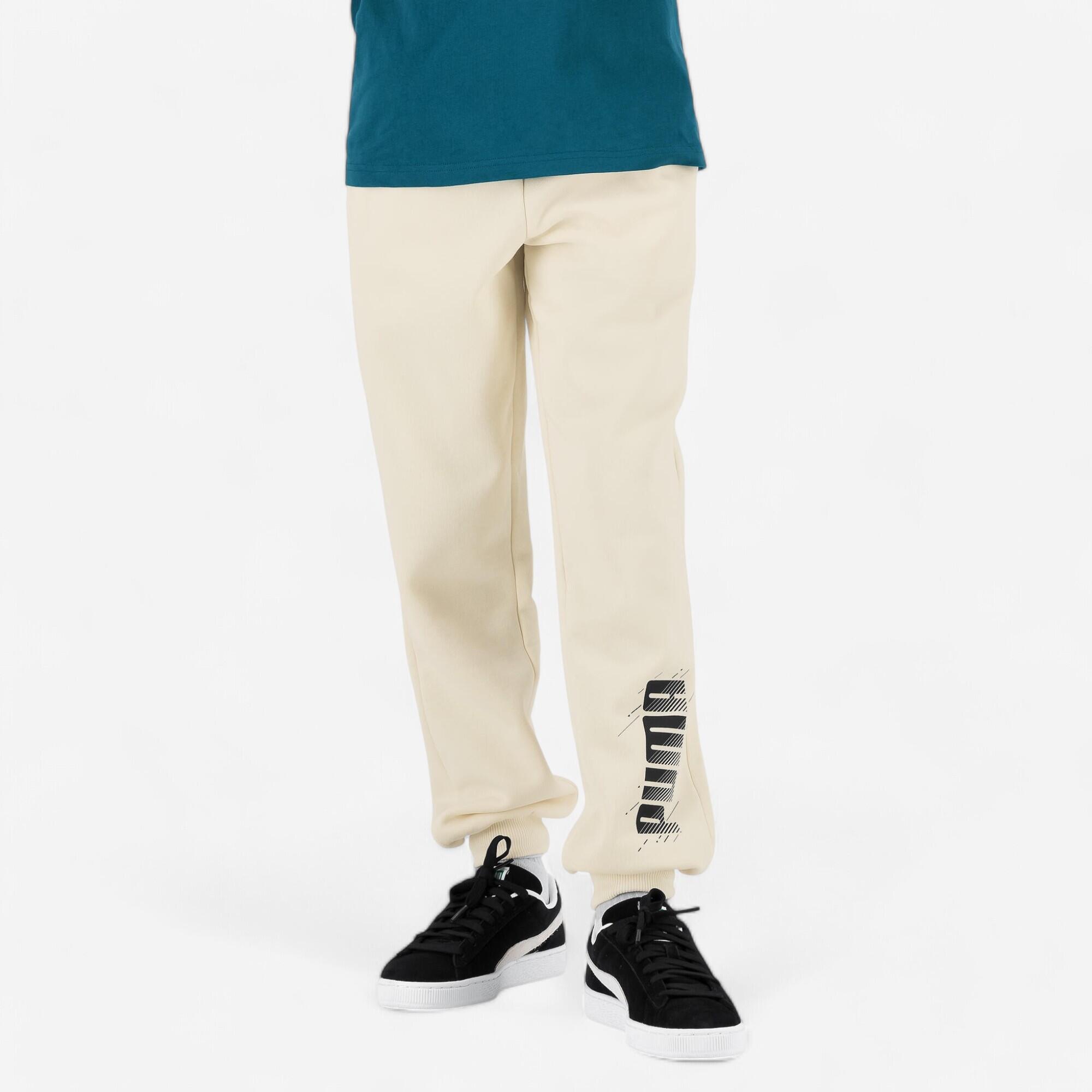 Detské joggingové nohavice PUMA béžové s nápisom 116 cm