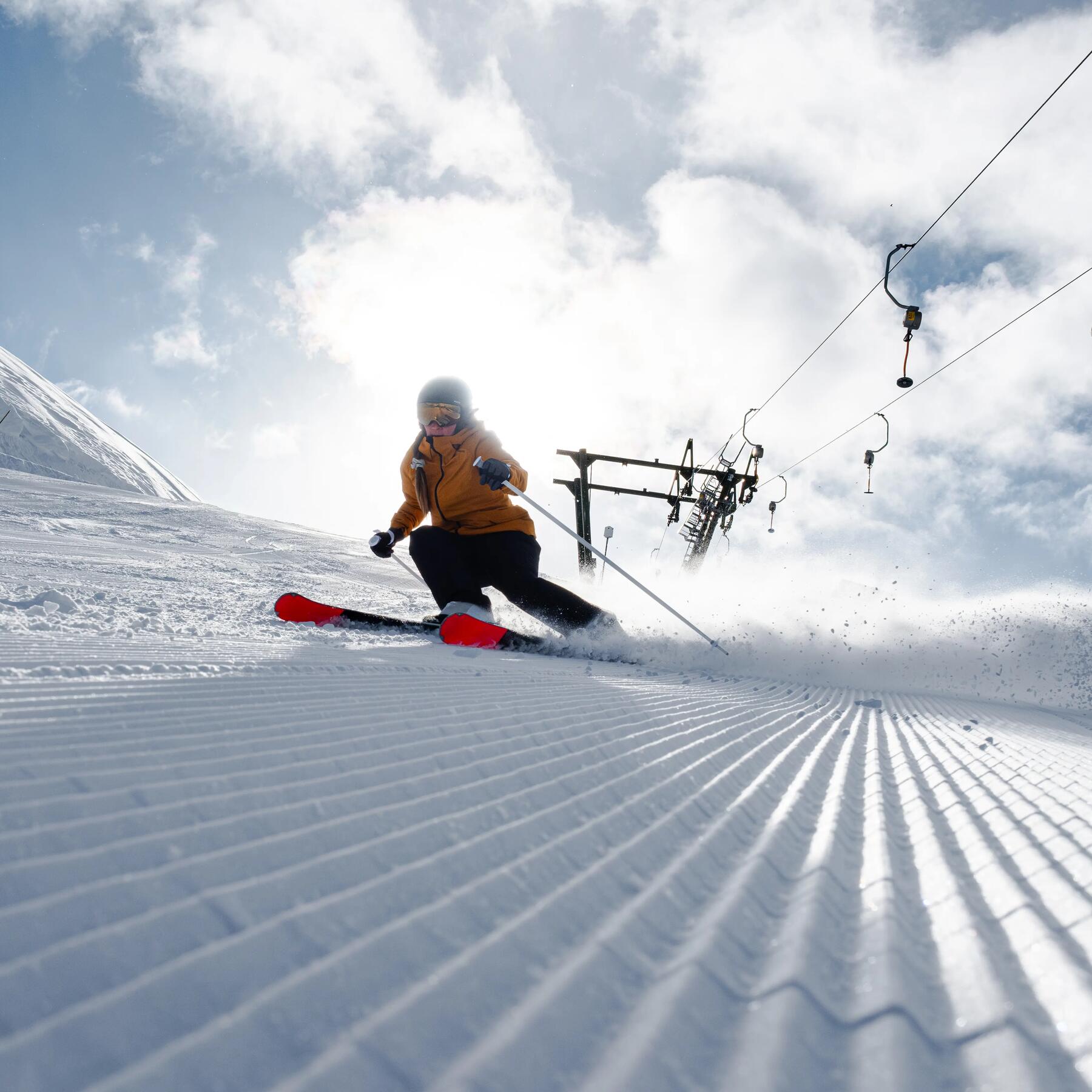 Femme ski de piste neige damée decathlon