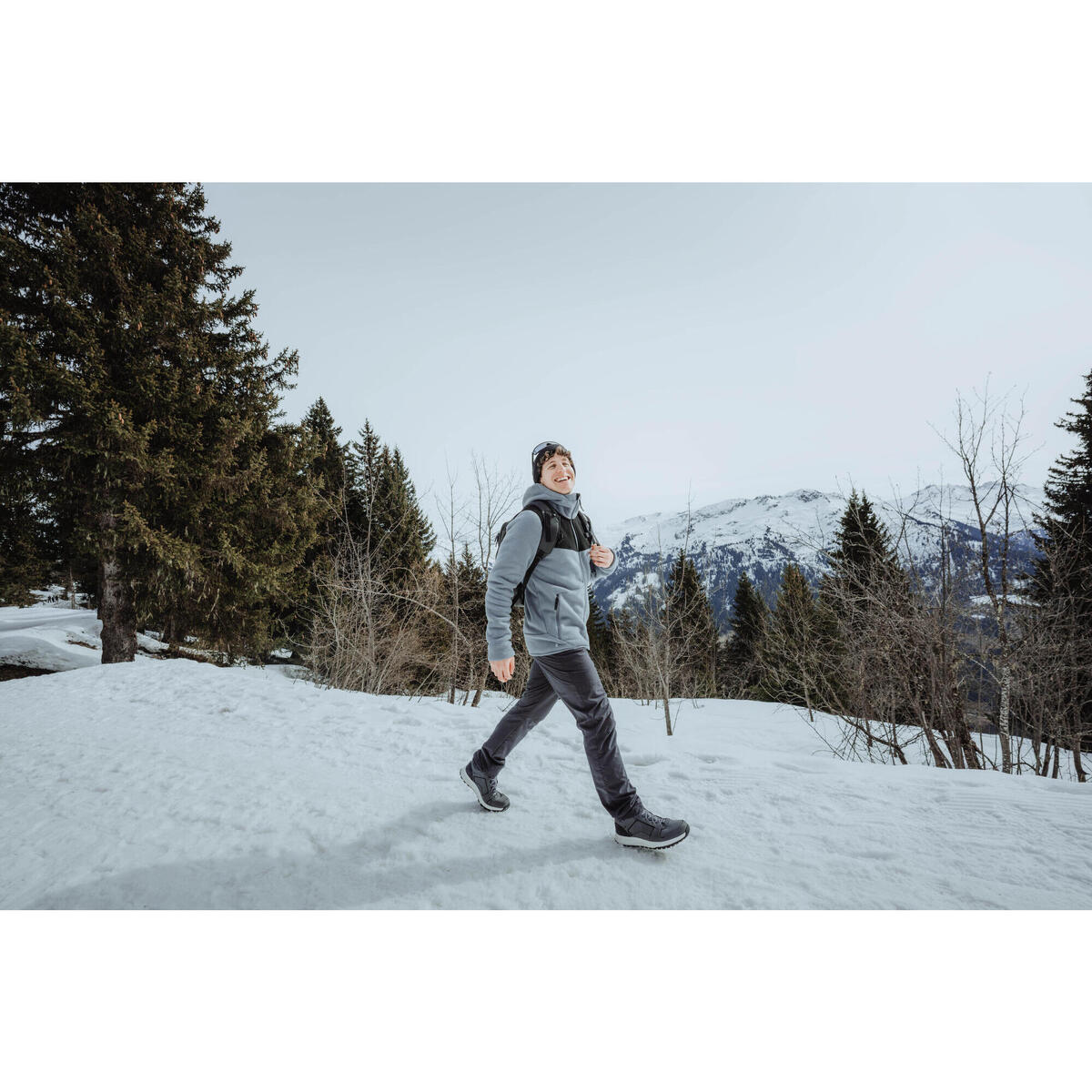 chaqueta-polar-de-montana-y-nieve-con-capucha-hombre-quechua-sh500.jpg