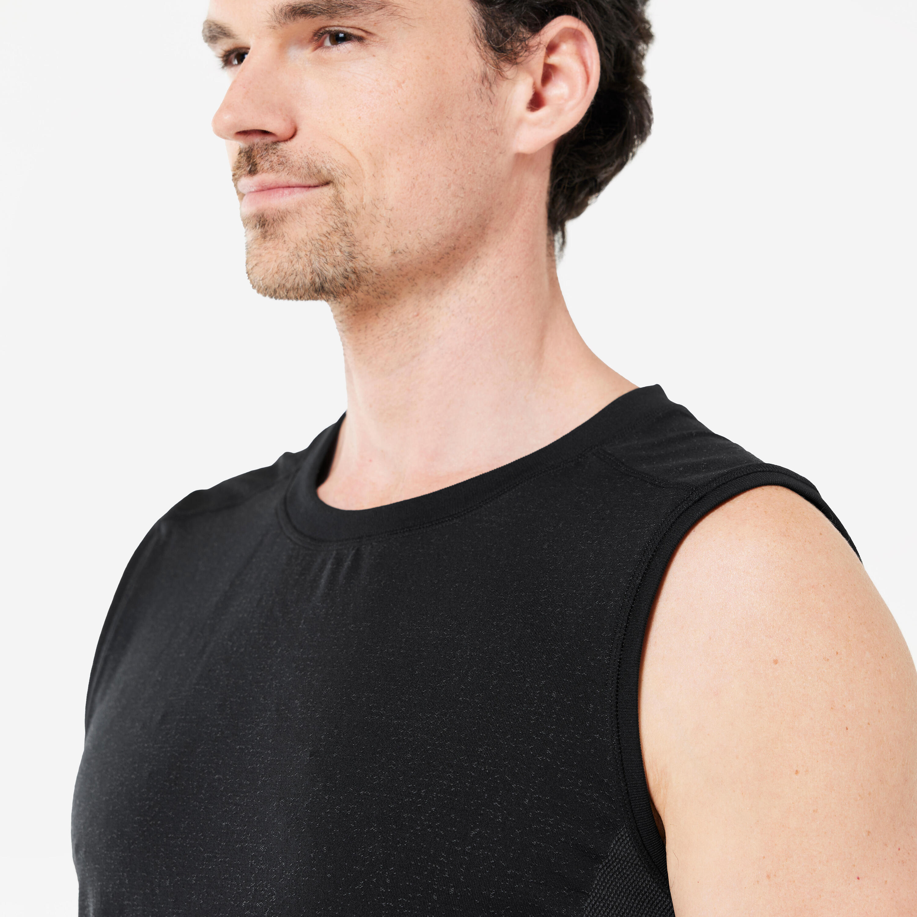Naadloos en mouwloos shirt voor dynamische yoga heren zwart 3/6
