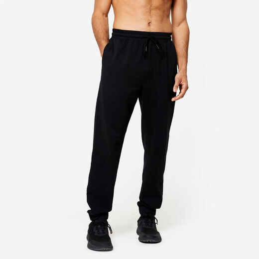 
      Pantalón jogger de fitness con bolsillos para Hombre Domyos 500 negro
  