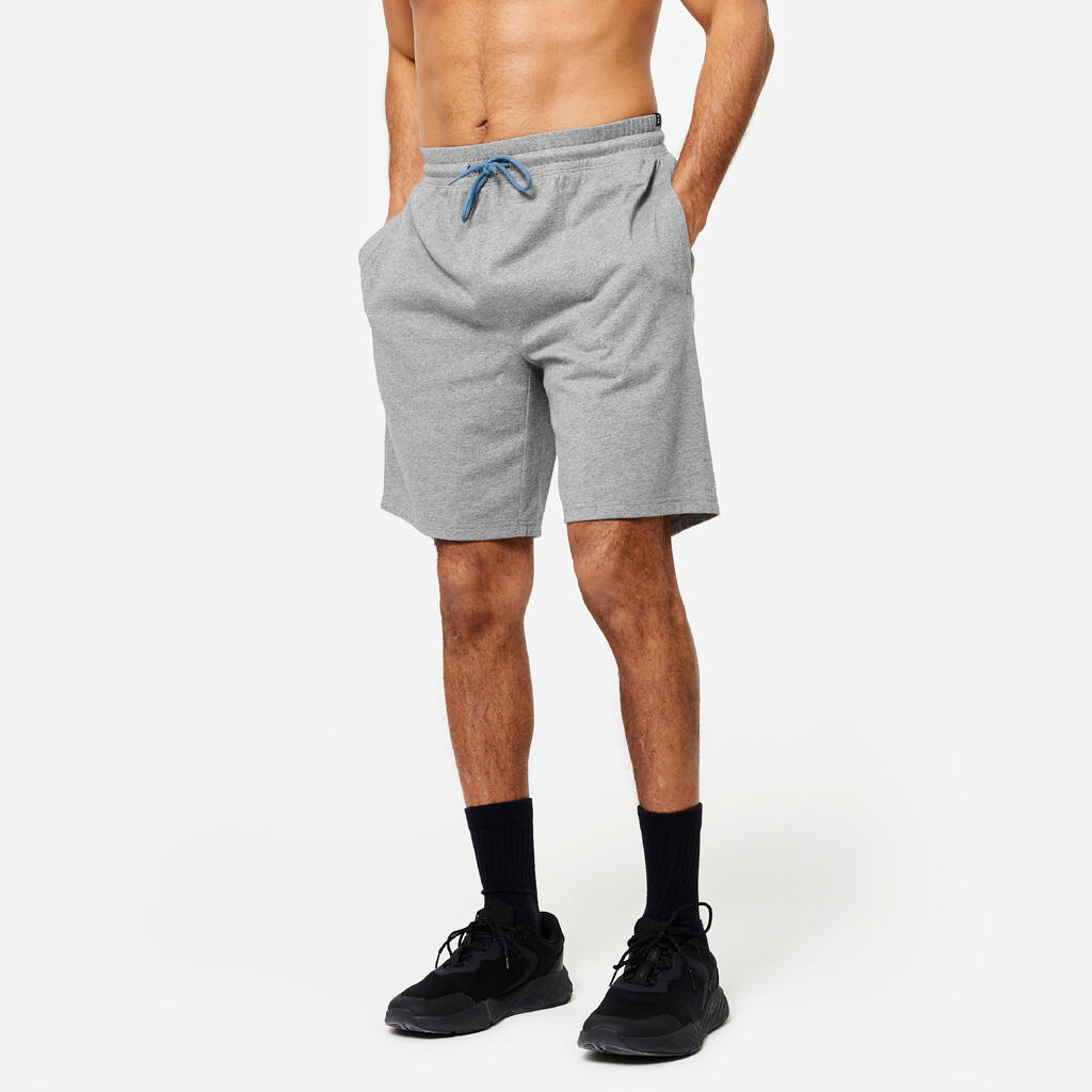 Pantaloneta de fitness con bolsillos para Hombre Domyos 500 gris