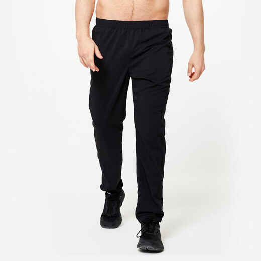 
      PANTALÓN FITNESS ESSENTIAL HOMBRE NEGRO CORTE REGULAR TRANSPIRABLE
  