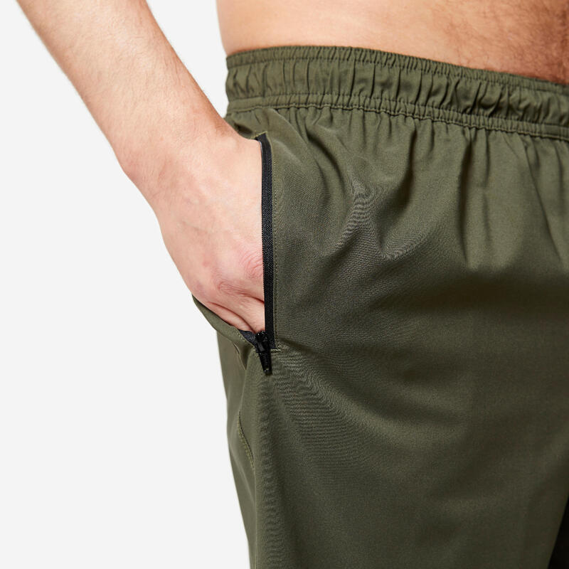 Ademende basic fitness short voor heren zakken met rits kaki