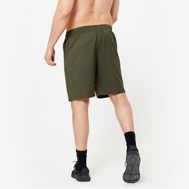 Short de fitness essentiel respirant poches zippés homme - kaki uni