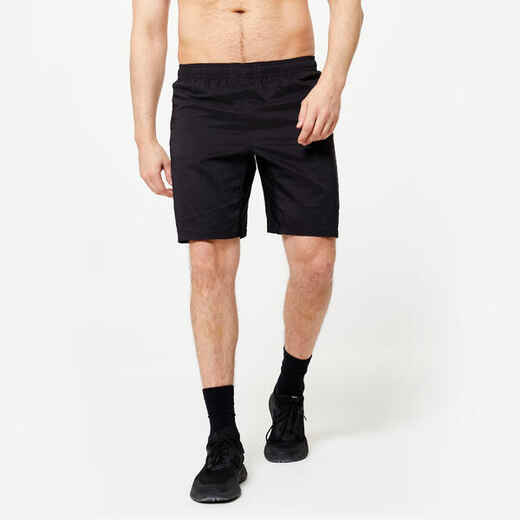 Short de fitness transpirable con bolsillos y cierre negro hombre Essential 120