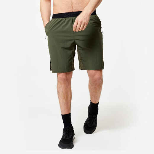 
      Pantaloneta de fitness con bolsillos para Hombre Domyos 500 caqui
  