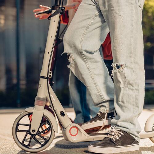 TROTTINETTE JUNIOR M900 BORDEAUX ET TOUCHE ORANGE
