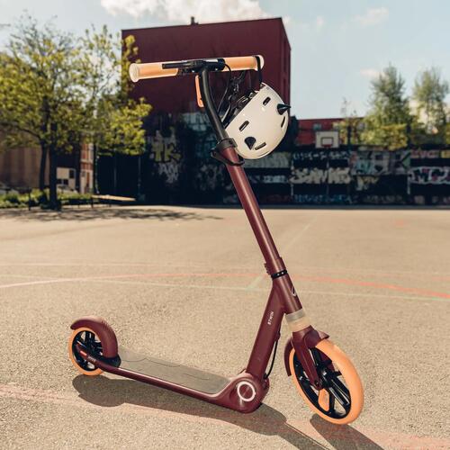 TROTTINETTE JUNIOR M900 BORDEAUX ET TOUCHE ORANGE