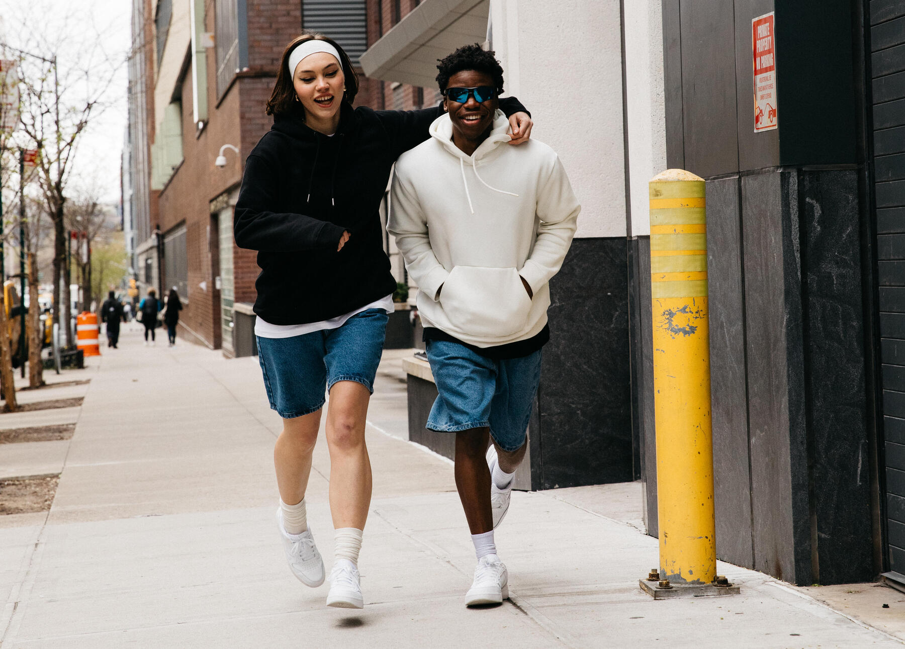 2 people walking side by side