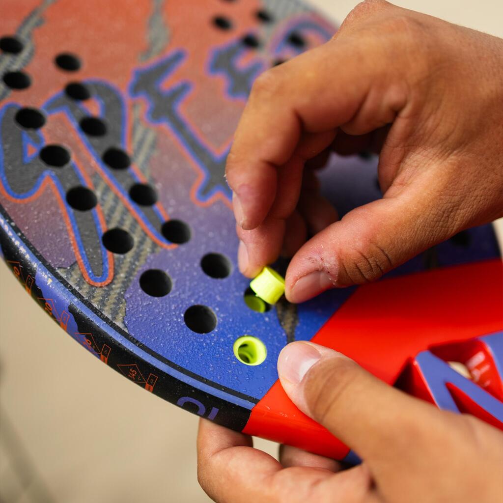 Dušilec vibracij za tenis