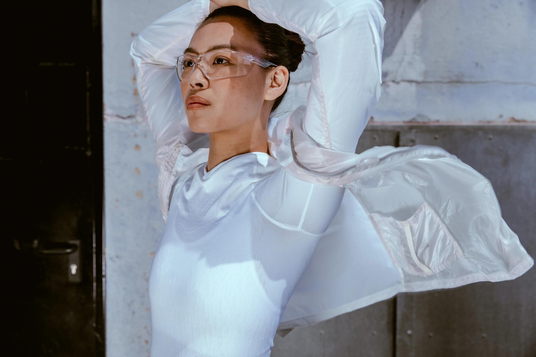 woman opening up her jacket