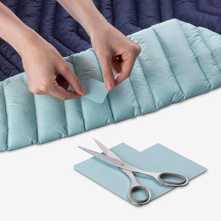 Пуховик жіночий для альпінізму темно-синій/блакитний