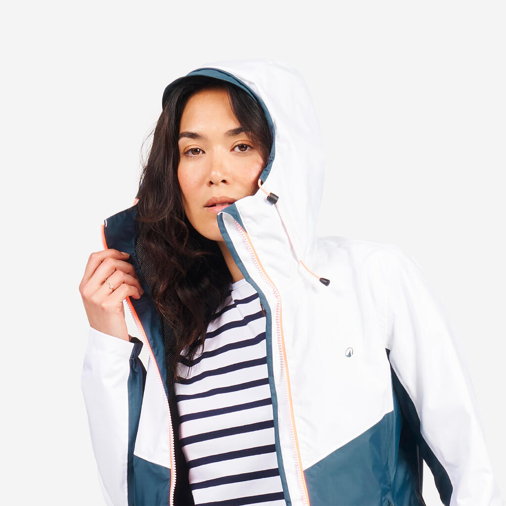 Chamarra de vela impermeable blanco con naranja para mujer Sailing 100