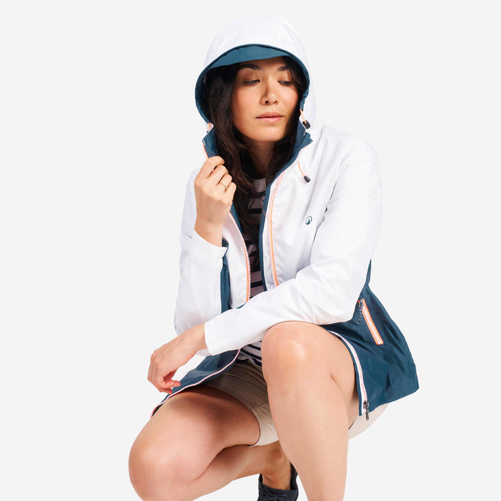 Chamarra de vela impermeable blanco con naranja para mujer Sailing 100