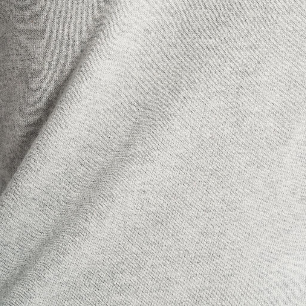 Suéter de golf de algodón con cuello V gris para mujer MW100