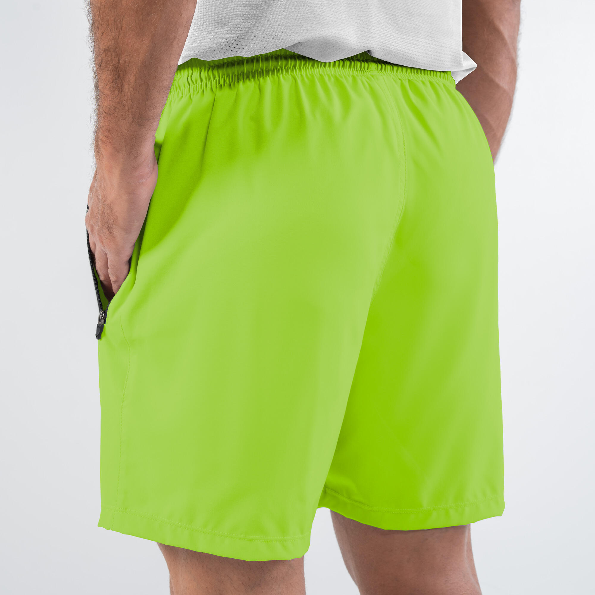 Pantaloneta de fitness para Hombre NKI verde neón Decathlon