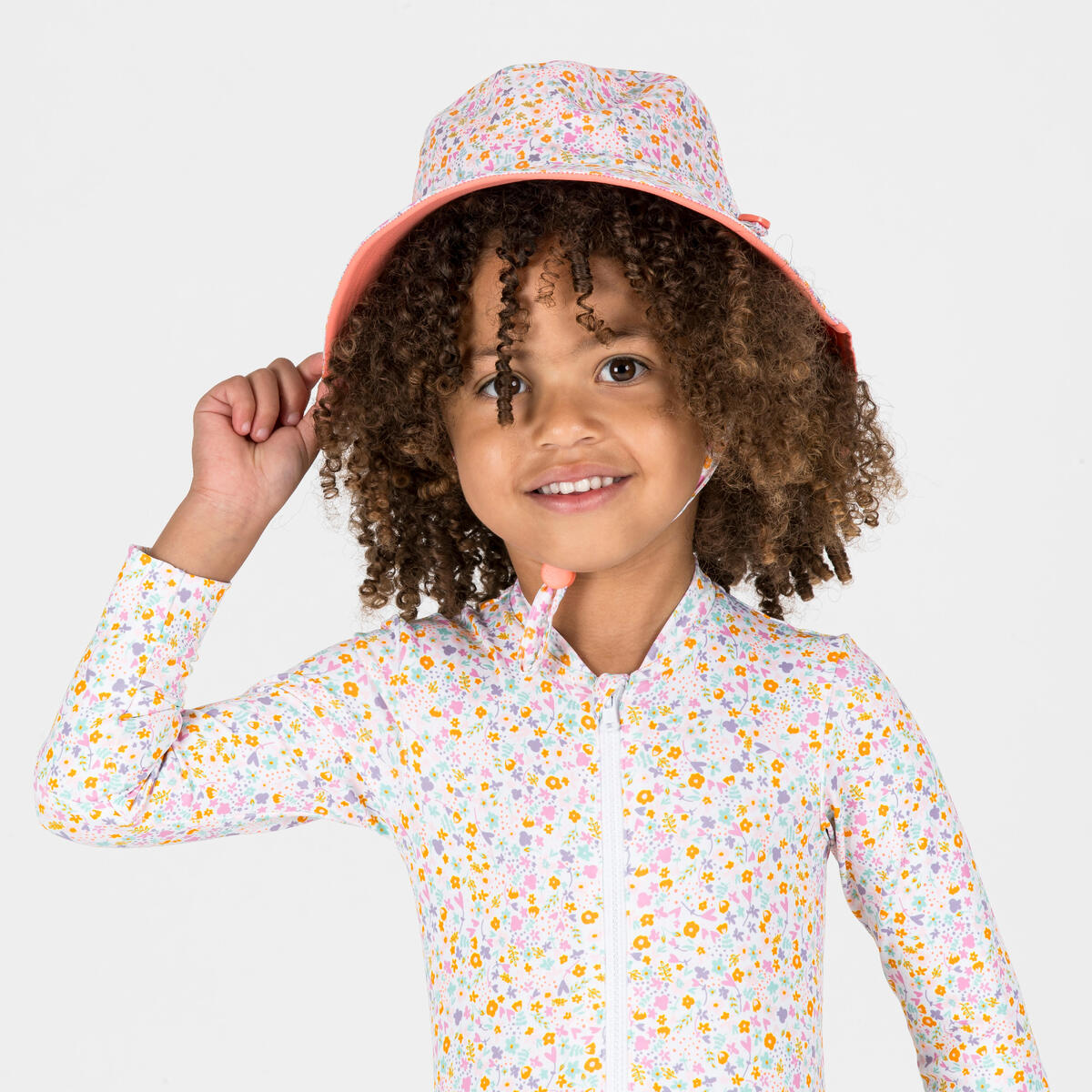 Chapeau anti UV réversible Bébé - corail et imprimés fleurs