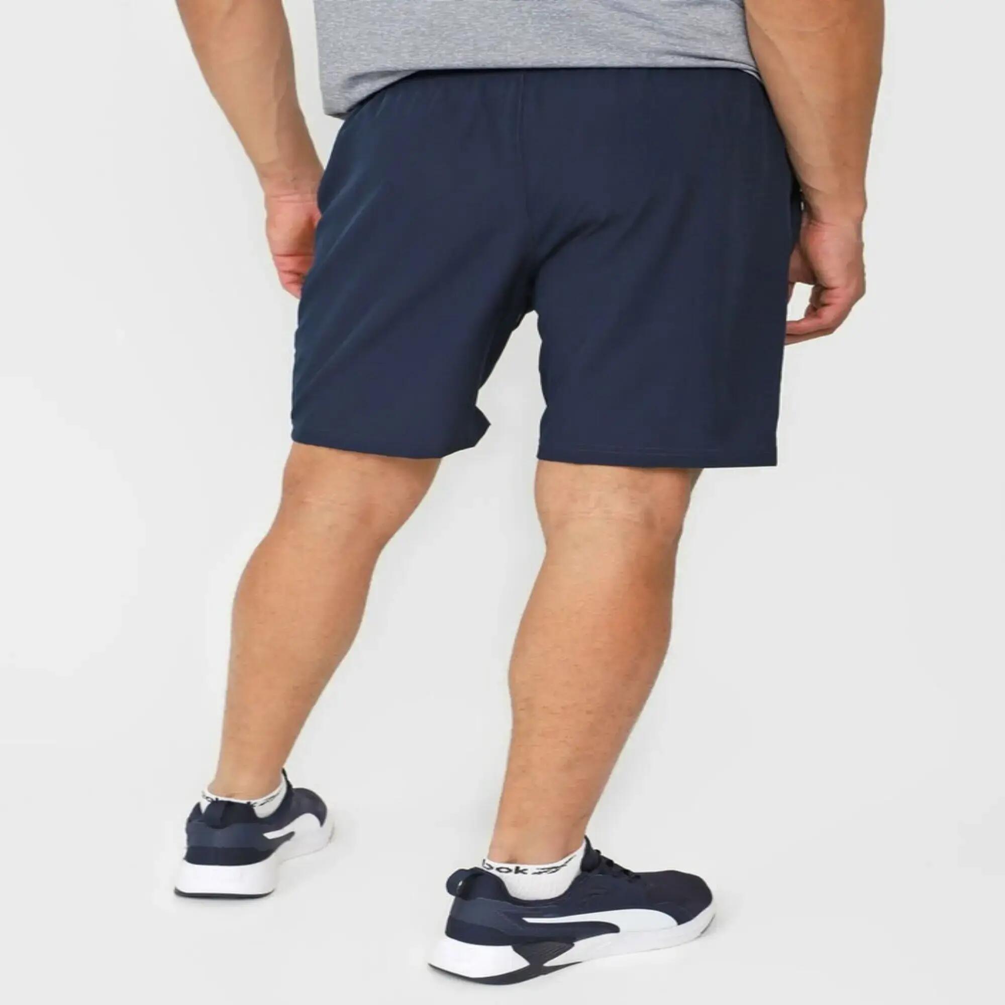Pantaloneta deportiva de microfibra para Hombre Wilson Flex azul 3/8