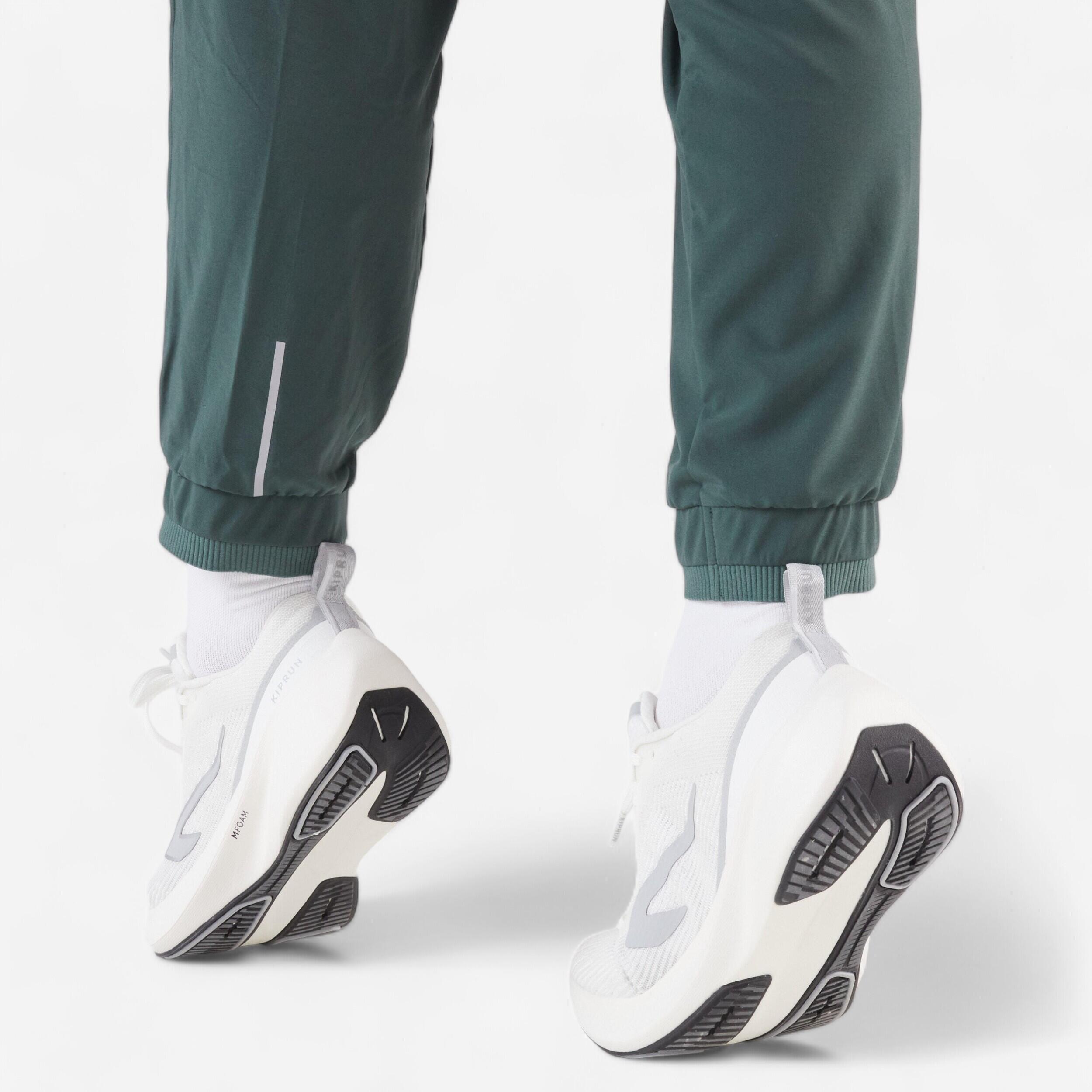 Pantaloni running donna RUN 500 DRY verde scuro 22/22