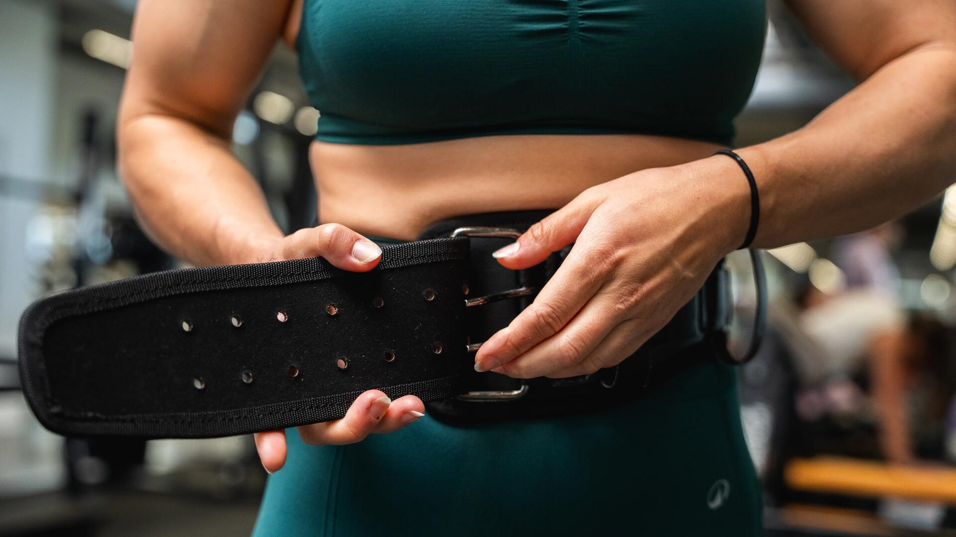 woman doing push-up with elastic band