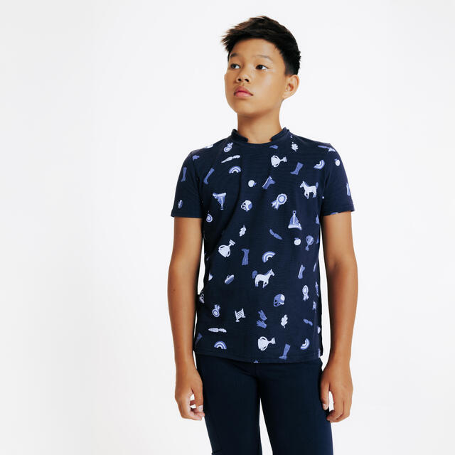 FOUGANZA POLERA PIQUÉ EQUITACIÓN MAGIC NIÑOS AZUL ESTAMPADO MANGA CORTA