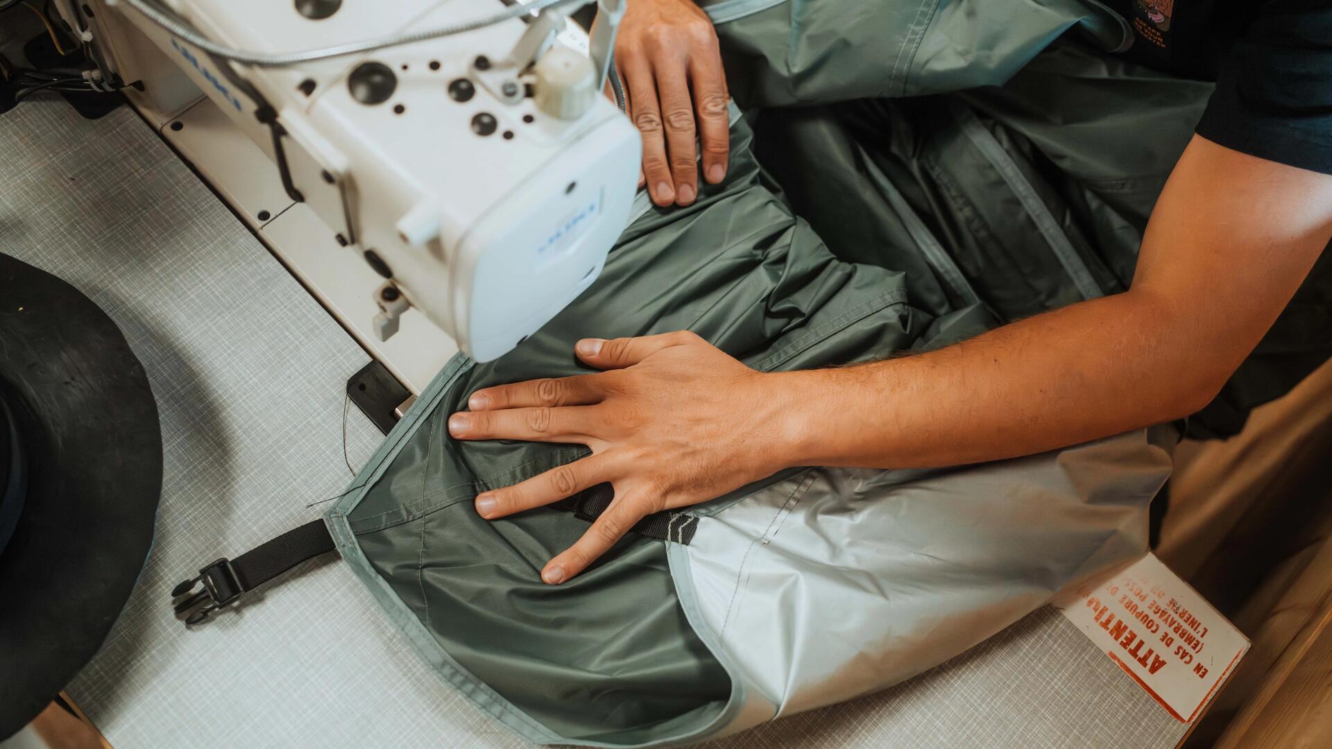 person repairing a garment