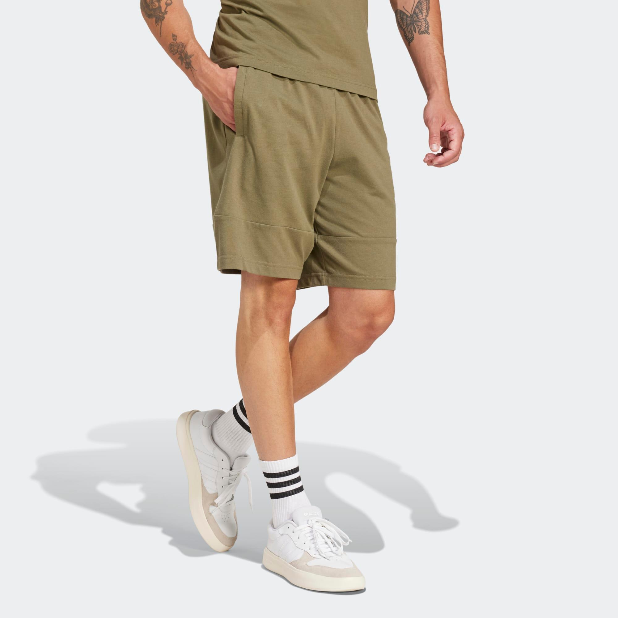 ADIDAS Pantaloncini ADIDAS uomo palestra regular fit traspiranti verdi