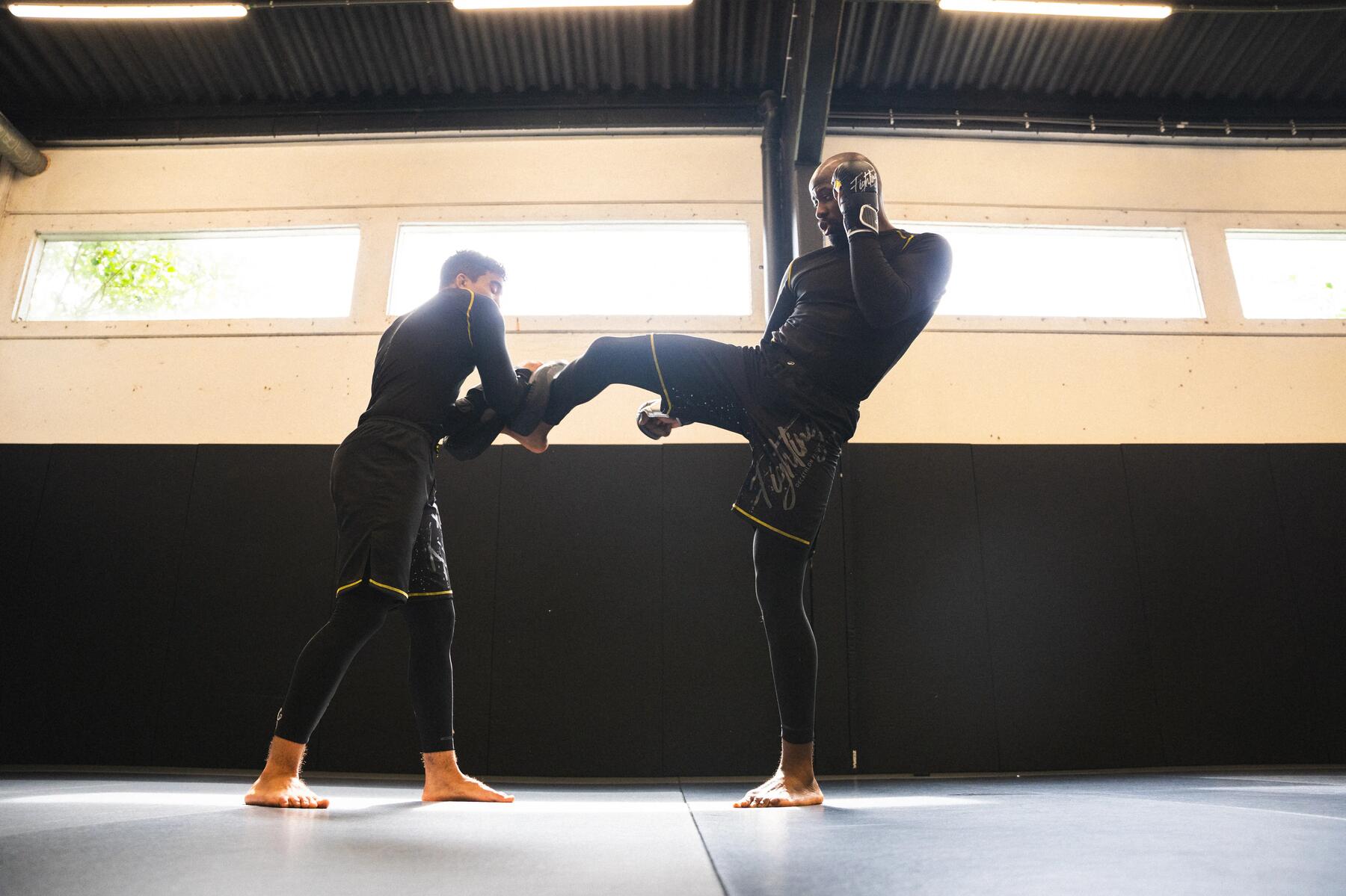 two men doing combat sport
