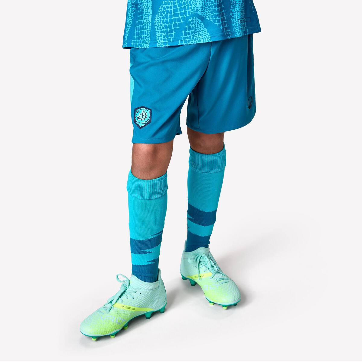 SHORT DE FOOTBALL ENFANT VIRALTO KIDS TURQUOISE BANDE VERTE