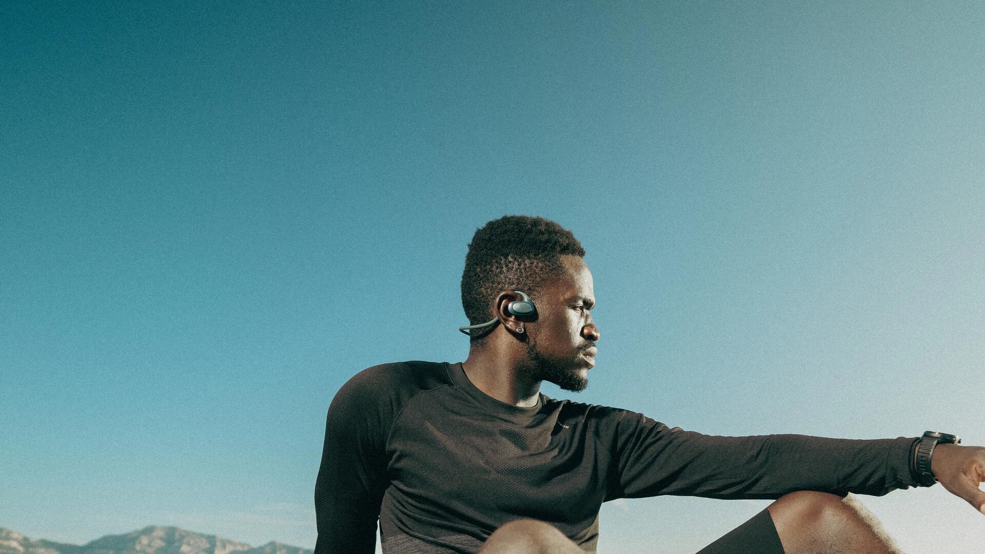 Woman setting a podcast while running