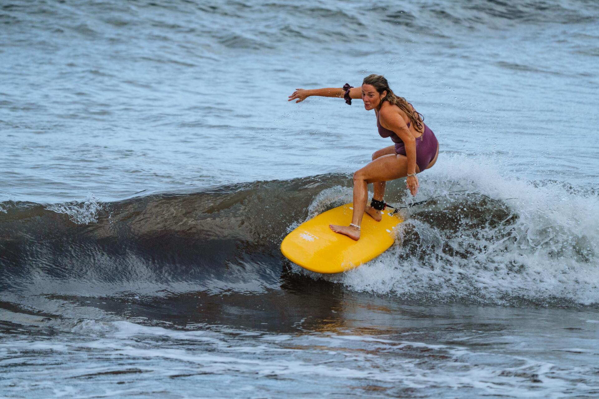 two white waves for intermediate surfer