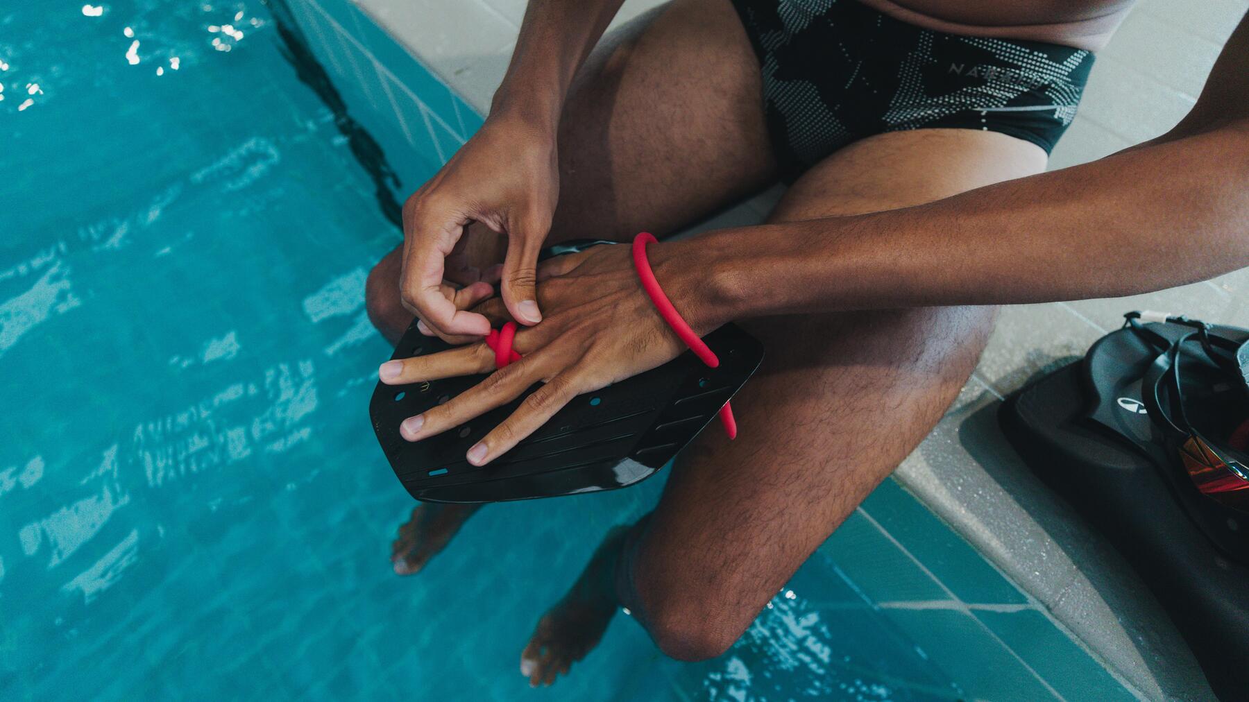 handpaddel schwimmen