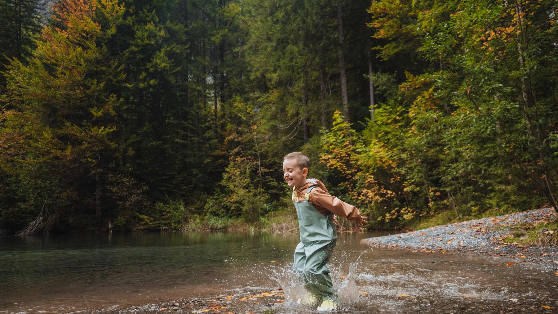 couple walking on the cliff overlooking the peninsula