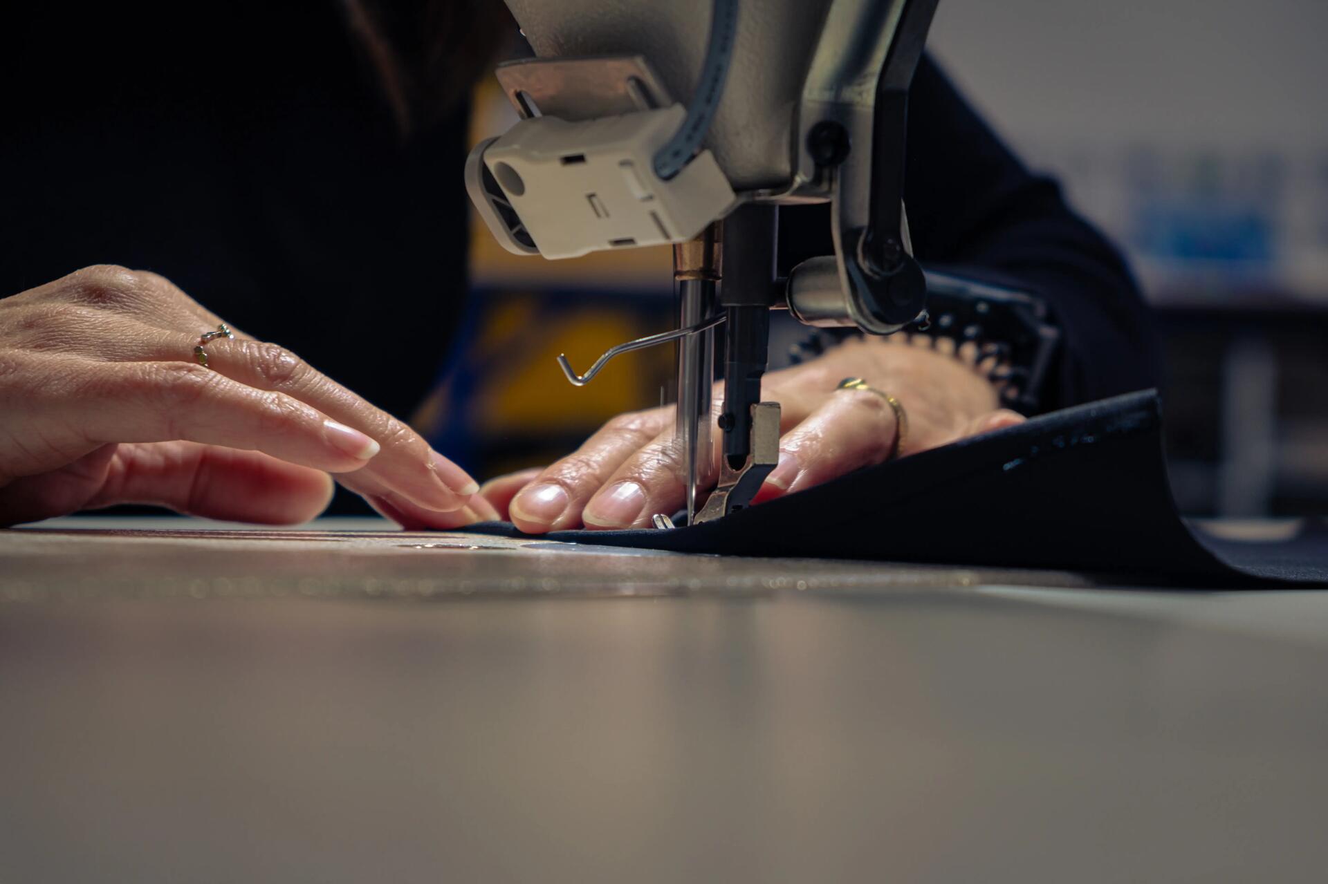 sewing machine repairing a jacket