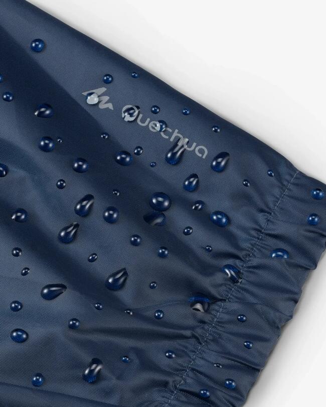 KIDS’ WATERPROOF HIKING OVERTROUSERS - MH100