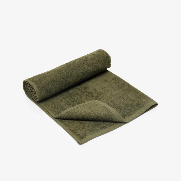 Folded khaki cotton fitness towel