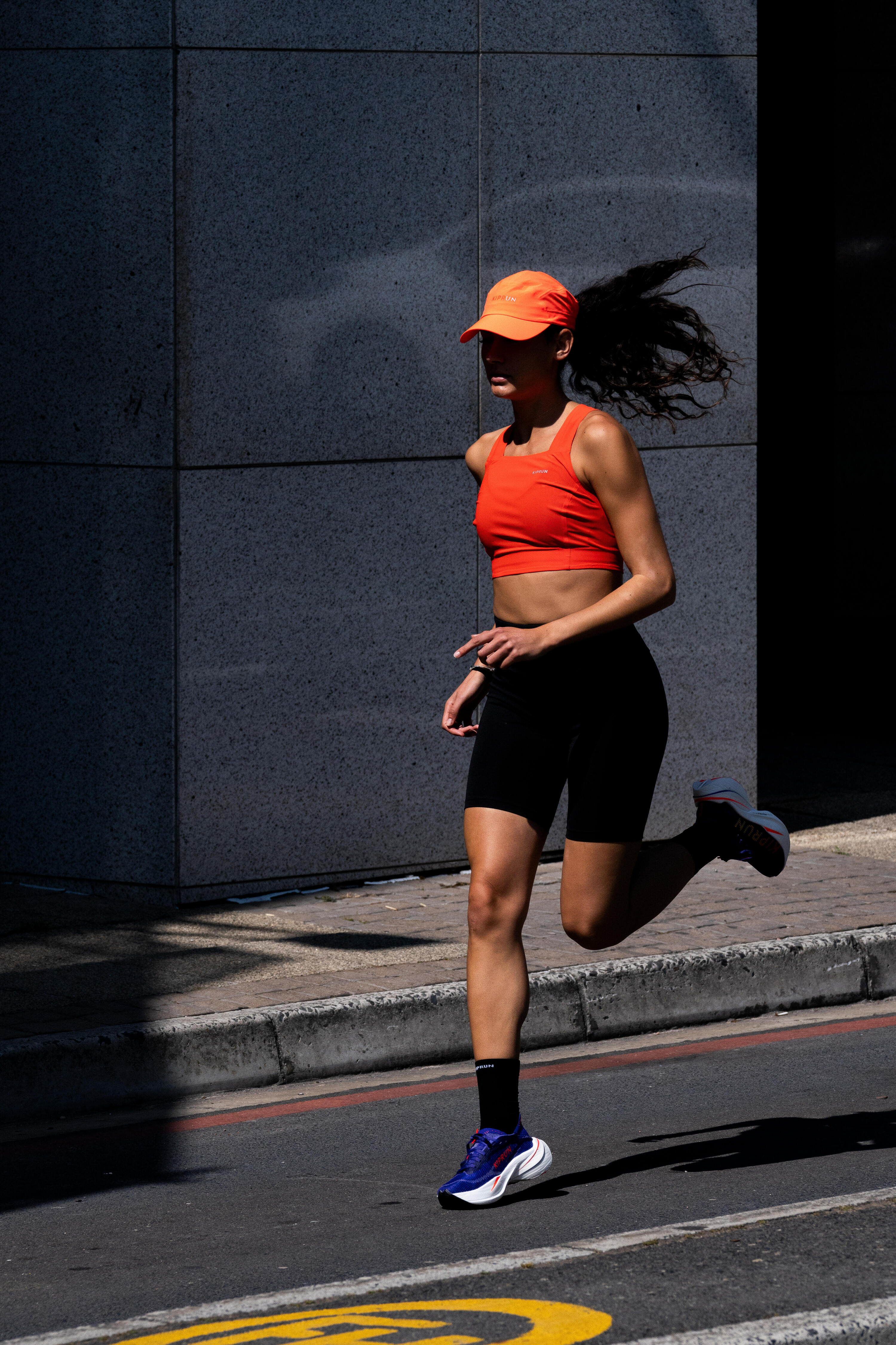 Short cycliste running femme - kiprun run 500 confort noir 7/11