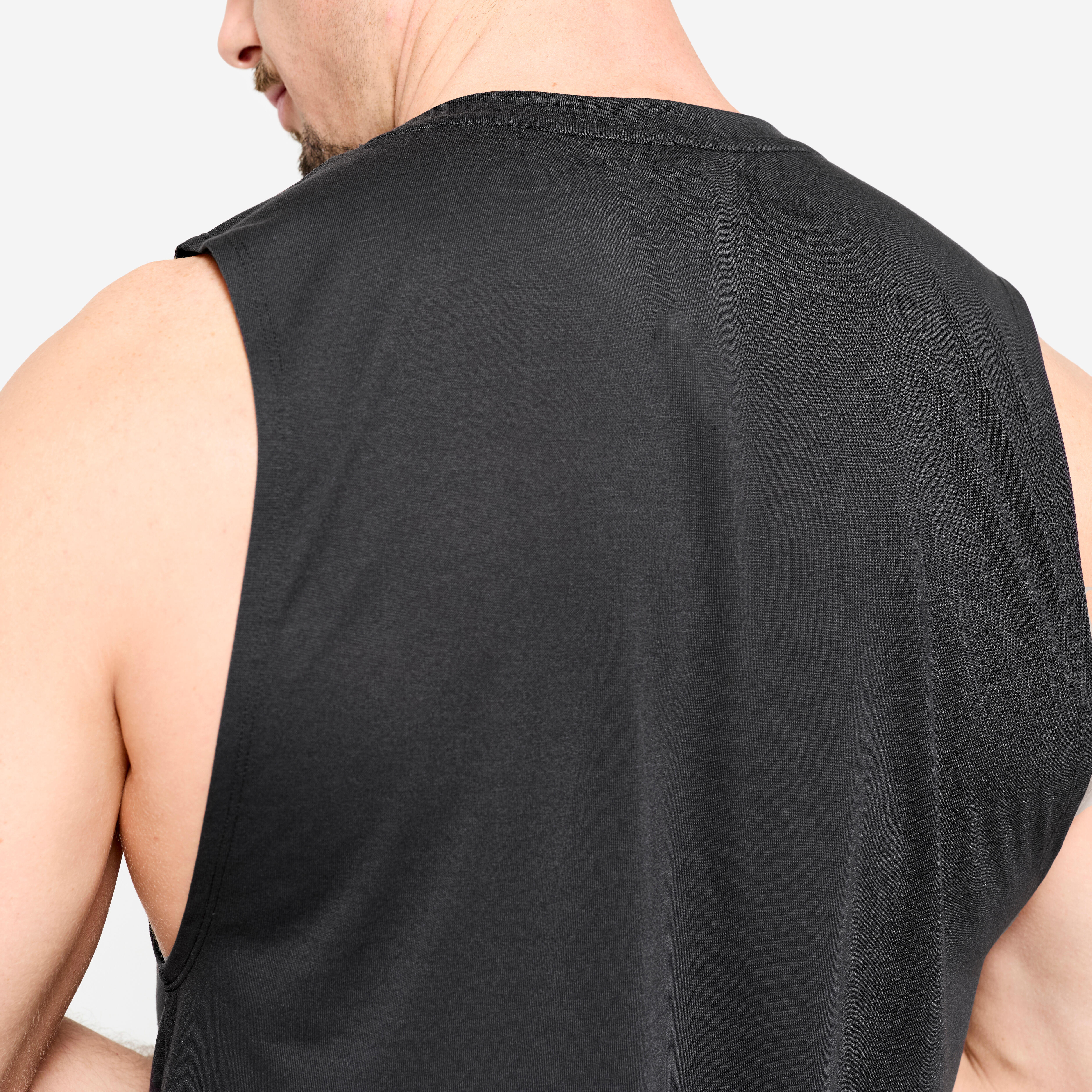 Camisole de cross training respirant slim col rond homme - noir - DOMYOS