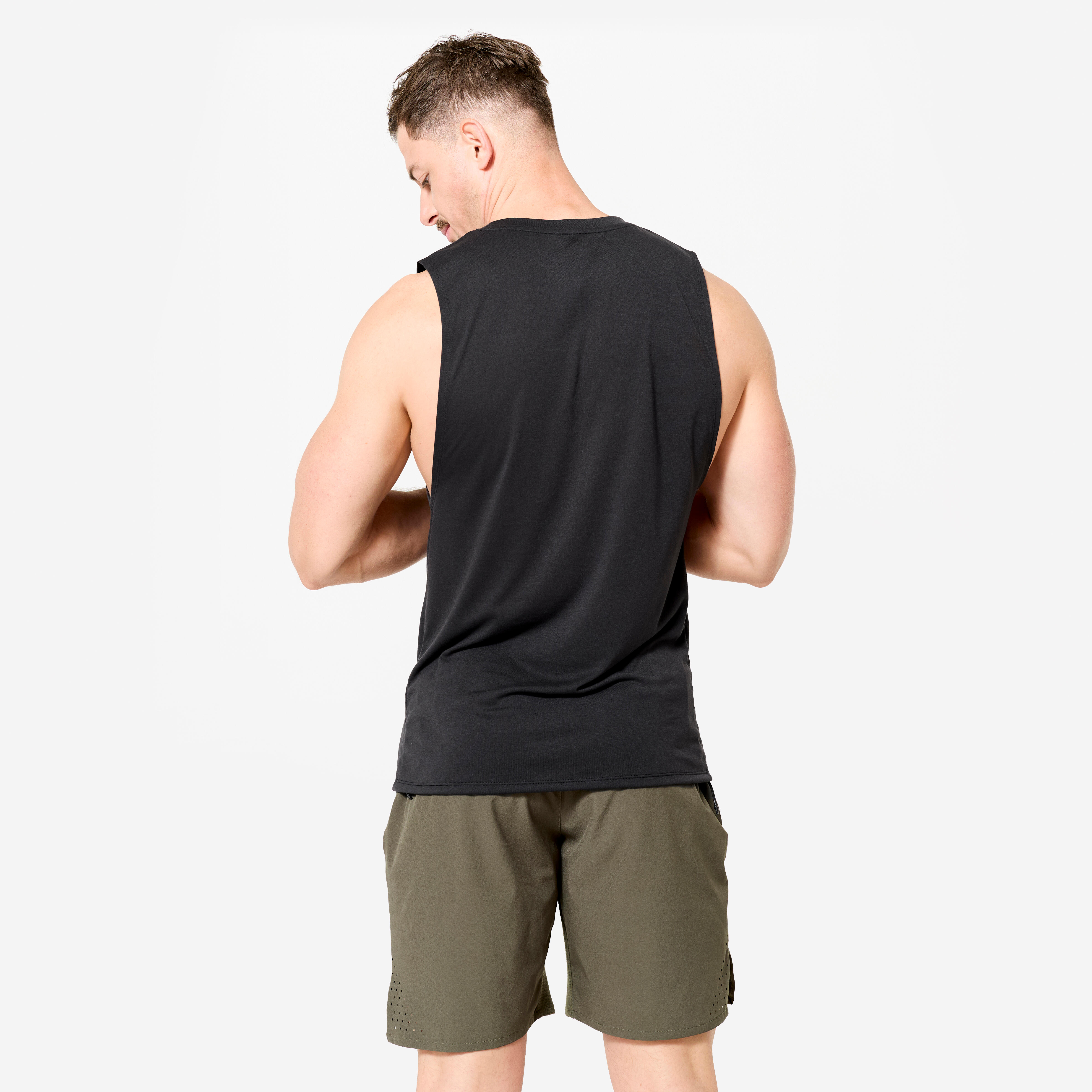 Camisole de cross training respirant slim col rond homme - noir - DOMYOS