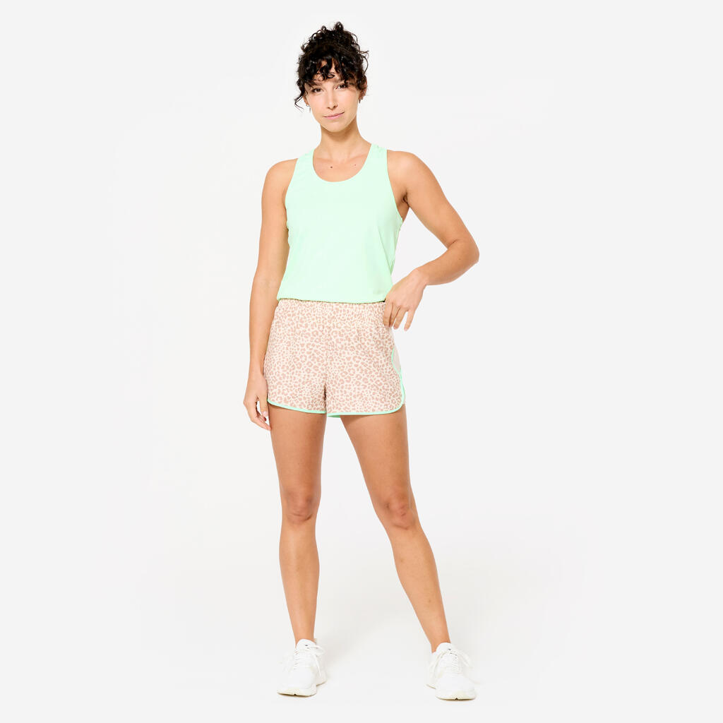 short de fitness court et léger, rose bande jaune
