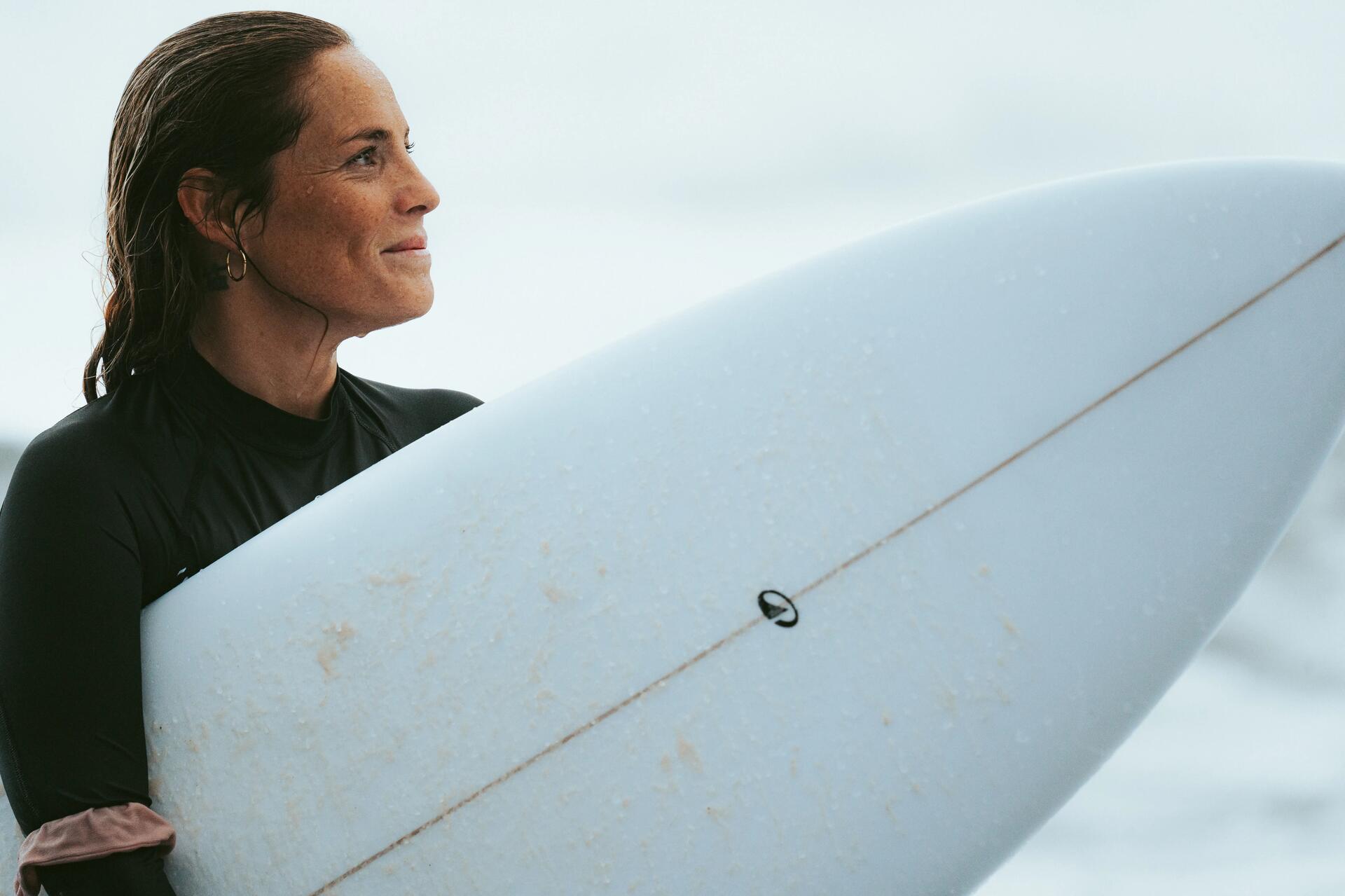 woman surfing the wave